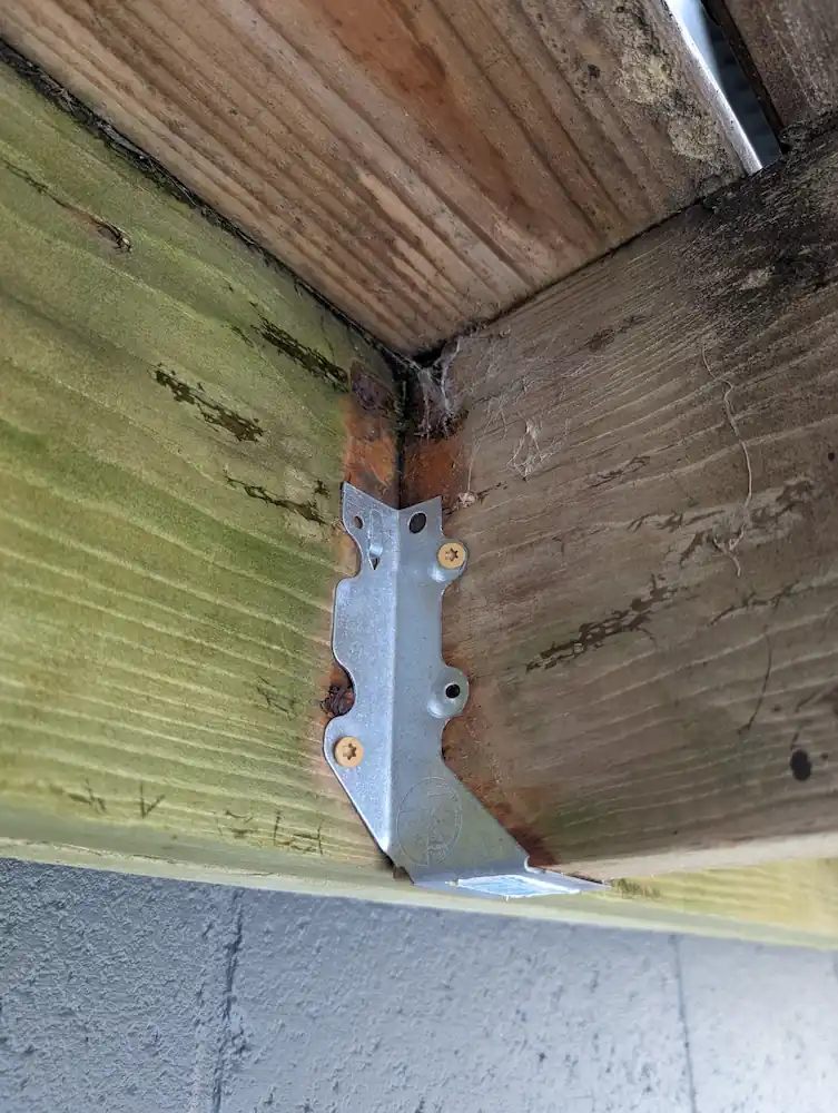 Incorrect screw connectors used in joist hangers on a Northern Michigan deck